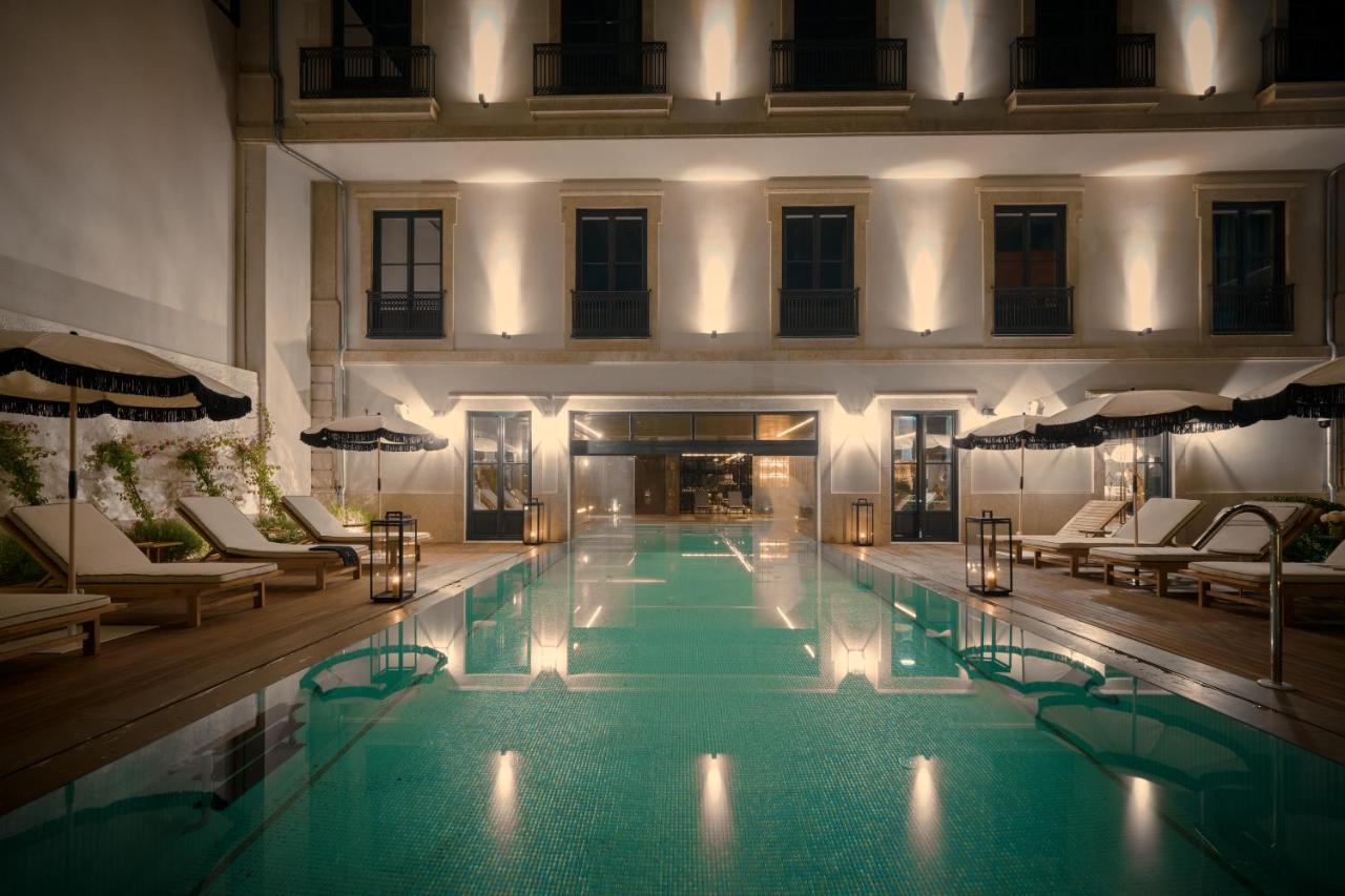 Ga Palace Hotel & Spa, A Xixth-Century Villa Порту Экстерьер фото The pool at the hotel