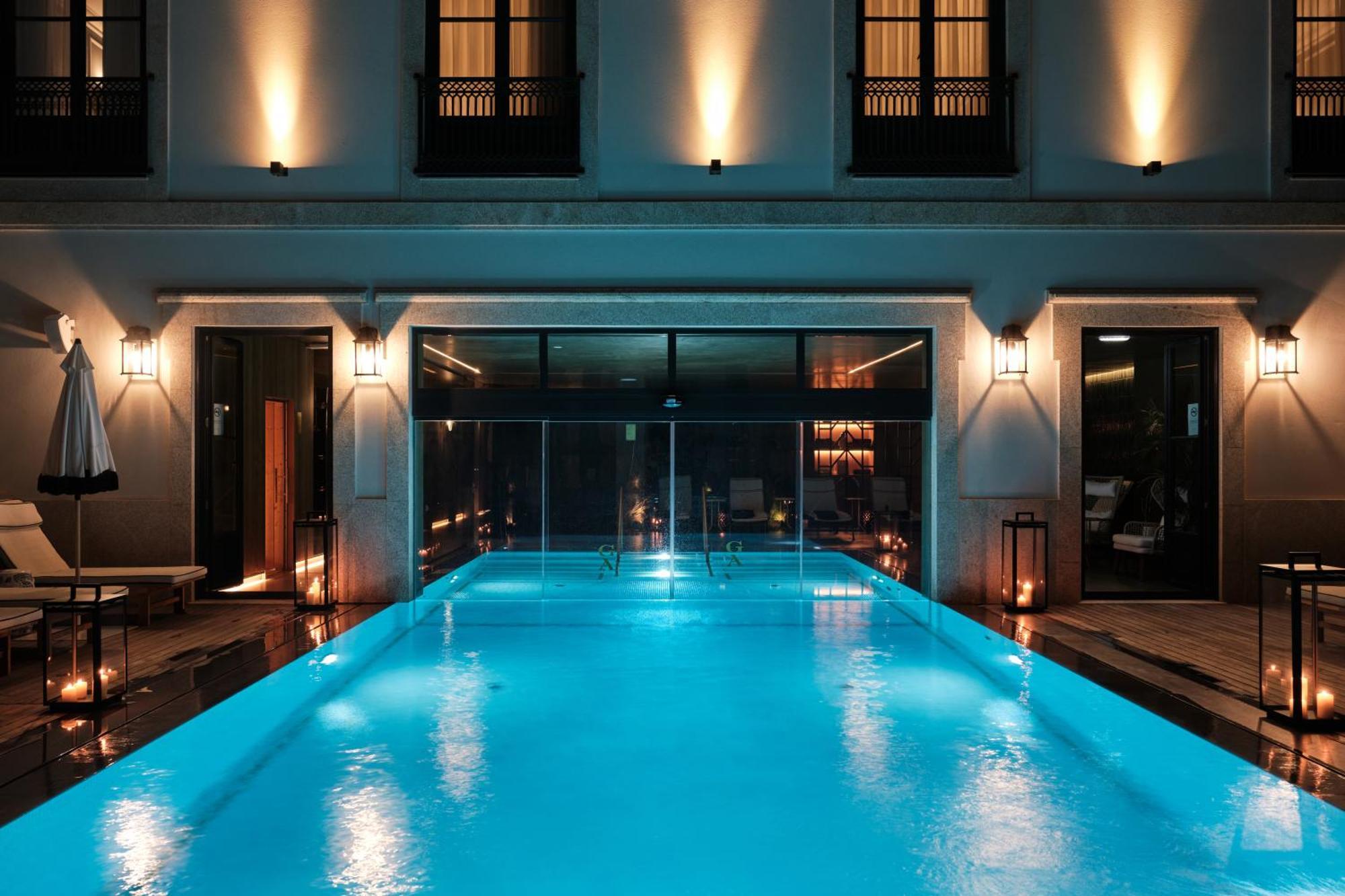 Ga Palace Hotel & Spa, A Xixth-Century Villa Порту Экстерьер фото The pool at the Hotel Indigo Athens